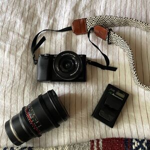 SONY ALPHA 6000 CAMERA +kit lens + Rokinon 1.5/85mm manual lens+ batteries